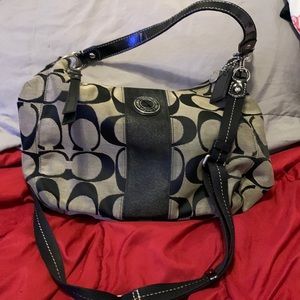 Black medium size hobo coach purse with charm K1261-F19281